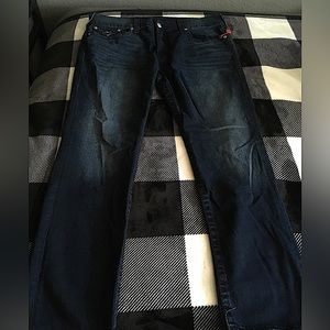 Dirty Dark Washed True Religion Jeans.
